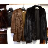 A vintage mid-brown fur coat with a mid-brown satin type lining,