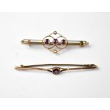 Two late 19th/early 20th century 9ct gold brooches comprising a bar brooch with a centred bezel set