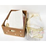 A large quantity of vintage linen to include bed linen, damask table cloths, napkins (2).