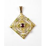 A 9ct gold Edwardian-style square necklace pendant with a bezel set centred red stone,