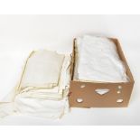 A large quantity of vintage linen to include bed linen, damask table cloths, napkins,