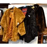 Three vintage faux fur coats comprising a dark brown wide lapelled coat with burgundy lining,