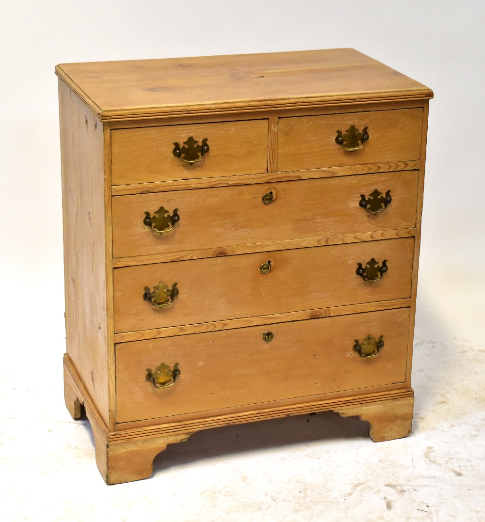 A vintage stripped pine chest of two small and two short drawers over three long drawers,