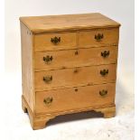 A vintage stripped pine chest of two small and two short drawers over three long drawers,