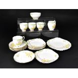 ROSLYN CHINA; a 'Springtime' part tea service comprising cups, saucers, side plates,