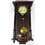 An early 20th century mahogany cased eight day Vienna-style wall clock,