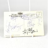 THE ROLLING STONES; a TWA postcard bearing the signatures of the rock legends.