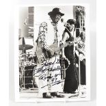 BO DIDDLEY; a reproduction black and white photograph bearing the star's signature, inscribed,