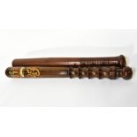 Two wooden truncheons,