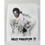 BILLY PRESTON; a black and white promotion reproduced photograph bearing the star's signature.