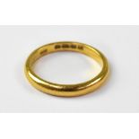 A 22ct gold band ring, size L, approx 3.2g.