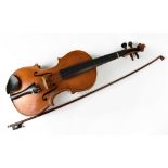 A cased full size violin with one-piece back.