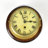 A Smiths Astral brass cased maritime clock, the dial set with Roman numerals and subsidiary dial,