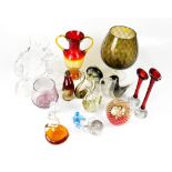 A collection of vintage and modern coloured art and clear glass paperweights, ornaments and vases,