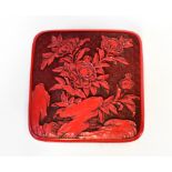 A late 19th/early 20th century cinnabar lidded box of square form,