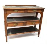An Edwardian oak three-tier buffet, the upper two tiers with pair of frieze drawers,