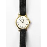 ROTARY; a ladies' 9ct gold wristwatch, the white enamelled dial set with Roman numerals,
