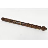 A Victorian wooden truncheon with applied painted crown over 'VR', with ring turned handle and grip,