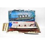 A collection of model ships to include cast examples, various shipping lines,