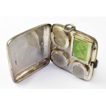 An Edwardian hallmarked silver coin and stamp case of square form,