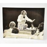 ANDRE PREVIN; a black and white photograph of the conductor,