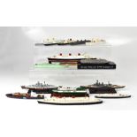 A collection of over fifty model ships from world shipping lines, to include the Queen Mary,