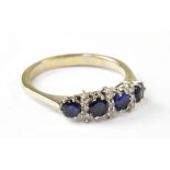 An 18ct white gold diamond and sapphire ring,