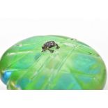 GLASFORM; a John Ditchfield iridescent glass paperweight in the form of a lily pad,