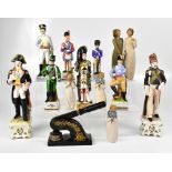 A group of eight military figures depicting various regiments, to include 'Highland Officer 1815',