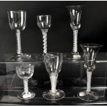 A group of six 19th century glasses with opaque air twist stems,