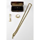 A 9ct gold tiepin in the form of a riding crop, stamped 375,