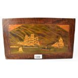 A 19th century marquetry plaque decorated with a three-masted Naval ship,