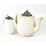 A large Victorian Staffordshire salt glazed relief moulded teapot with pewter lid, height 28cm,