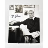 NEIL SIMON; a black and white photograph bearing his signature.