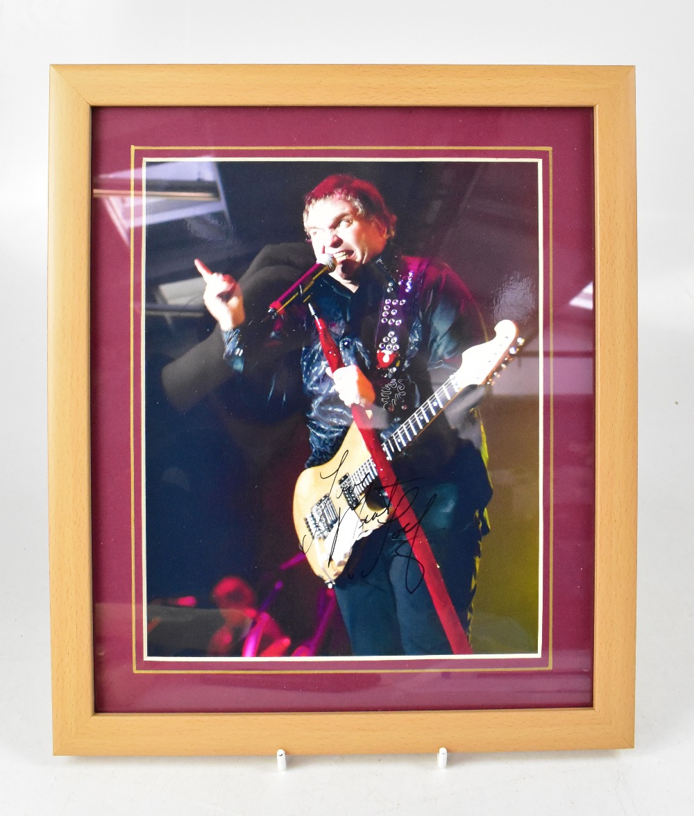 ROCK & POP; a group of nine autographed stock photographs of music stars to include Paul Simon, - Image 6 of 9