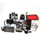 A quantity of vintage photographic equipment to include a Polaroid SX-70 Alpha 1 Land camera with