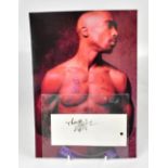 TUPAC; the star's signature on a scrap of paper and a photograph of the star (2).