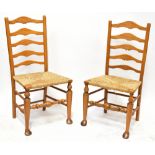 A set of six light oak reproduction Lancashire ladder back chairs,