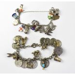 A silver charm bracelet with various charms to include shields, church, galleon, Irish harp,