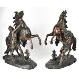 AFTER COUSTOU; a large pair of bronzed spelter marley horses, height 58cm (2).