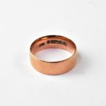 A 9ct rose gold wide band ring, size T, approx 6g.