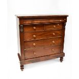 A Victorian mahogany Scottish chest of two short over three long drawers with a cushion drawer