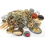 Various items of antique and vintage costume jewellery to include mourning brooches, earrings,