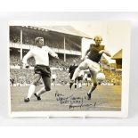 SIR BOBBY MOORE; a black and white photograph with copyright dated 15.8.