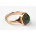 An antique 9ct rose gold ring in the Roman style,