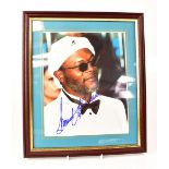 FILM; a group of four autographed promotional pictures comprising Samuel L Jackson, Robert Redford,