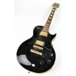 A Gibson-style electric guitar with black gloss body,