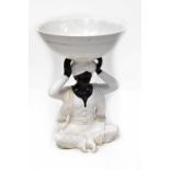 A 20th century ceramic decorative Blackamoor plant stand,