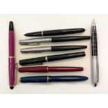 A small group of pens comprising a Parker Senior Duofold with blue body and 14ct nib numbered '35',