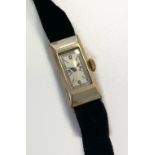 CYMA; a ladies' Art Deco cocktail watch with rectangular dial and fifteen jewel patented movement,